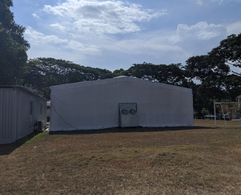 air con generator tent behind view